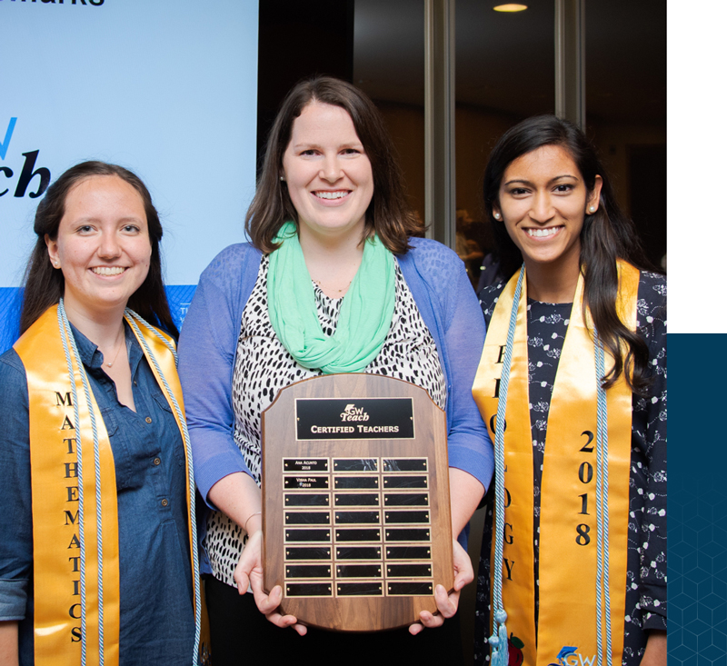 Three graduating students